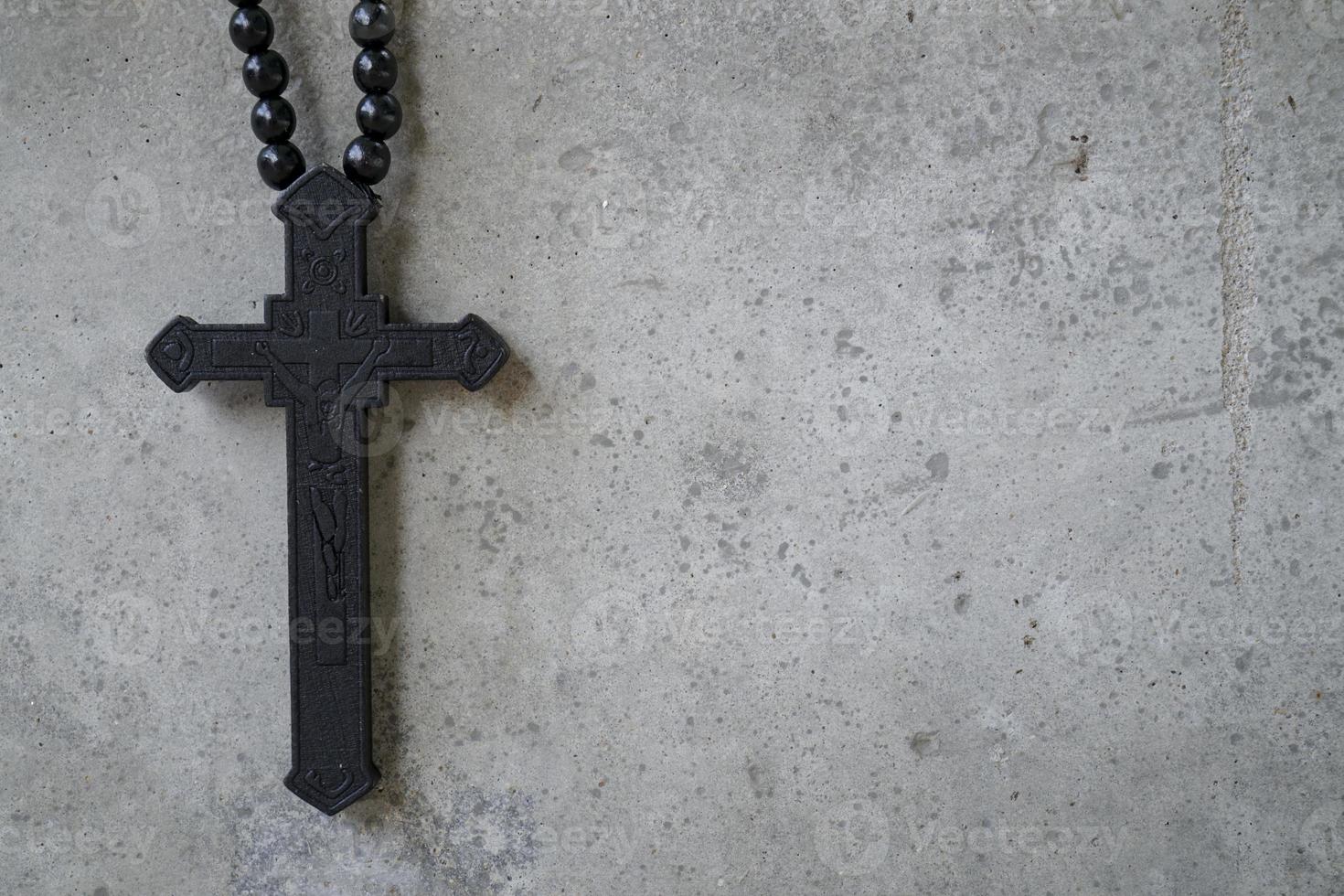 Christian cross with cement background. photo