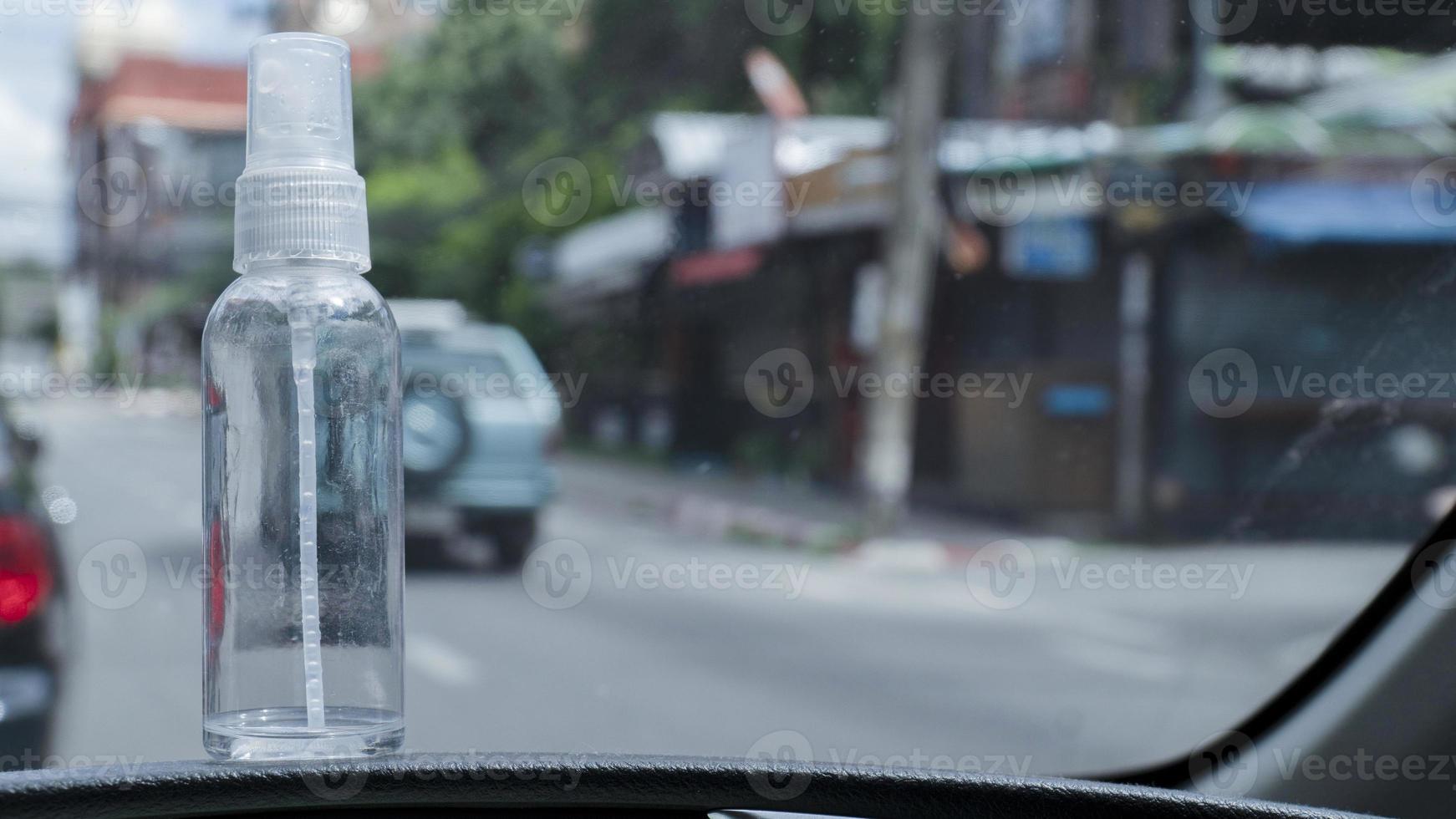 Tourists carry alcohol spray in the travel trip. photo