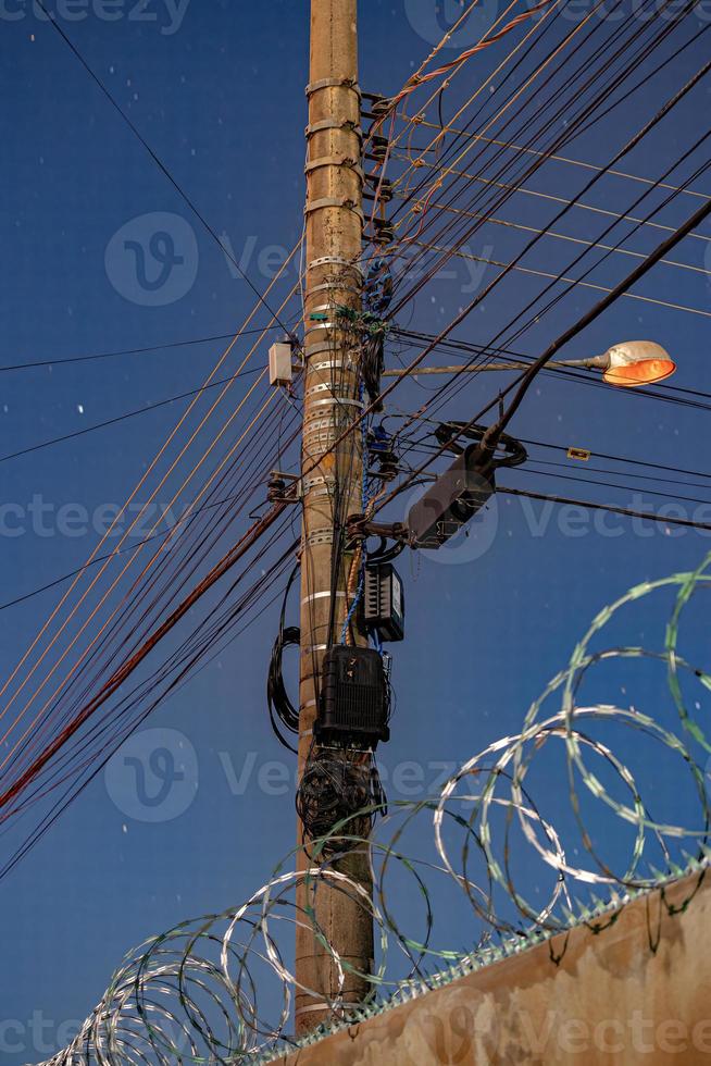pole with wires and electrical devices photo
