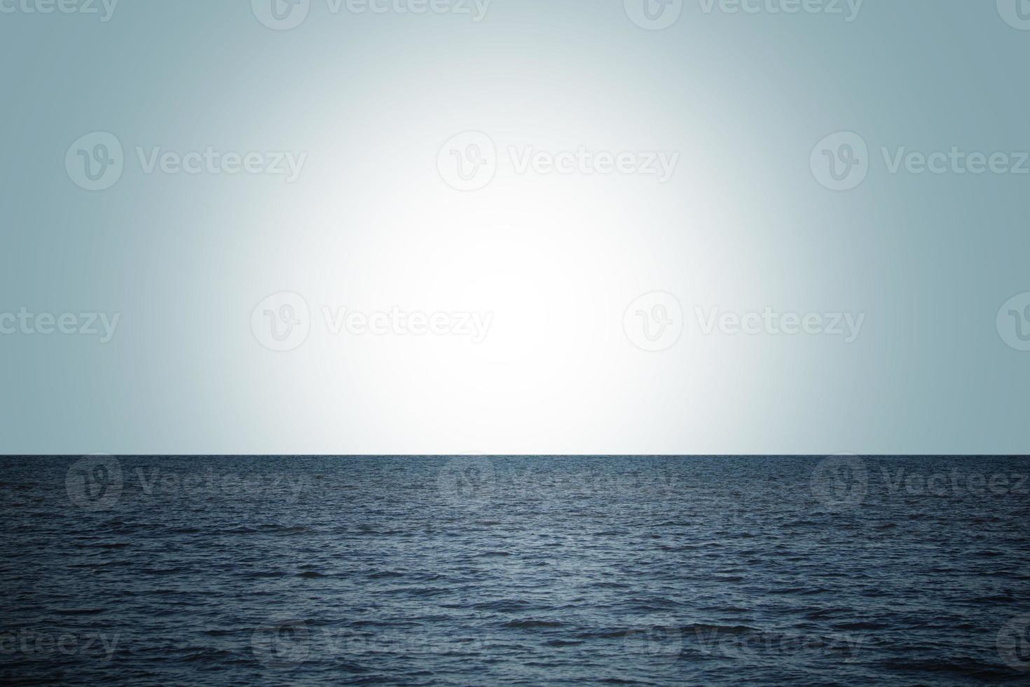 The dark blue ocean waves background. photo