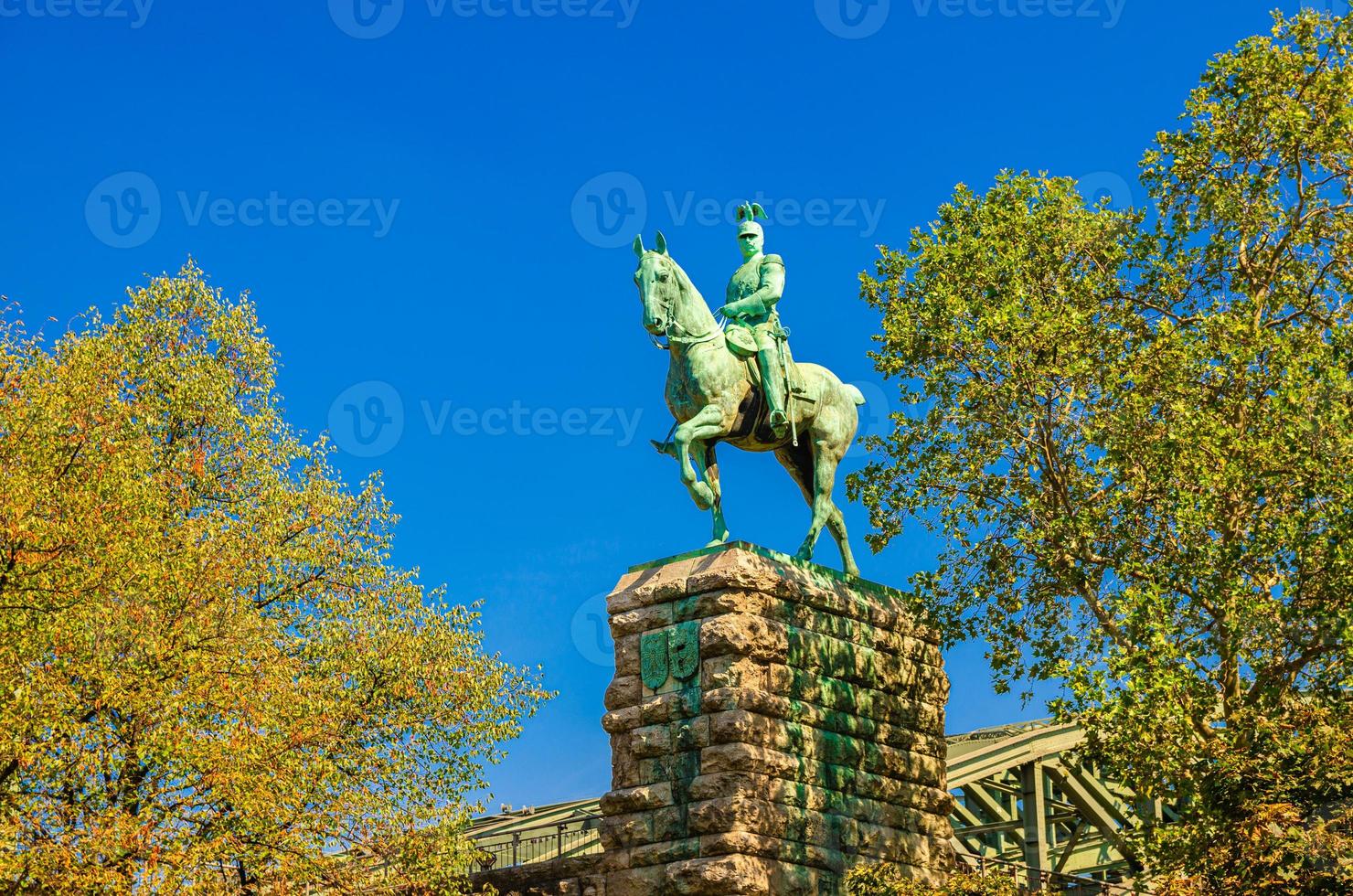 Equestrian Statue of Kaiser Wilhelm II monument on stone pedestal near Hohenzollern bridge photo