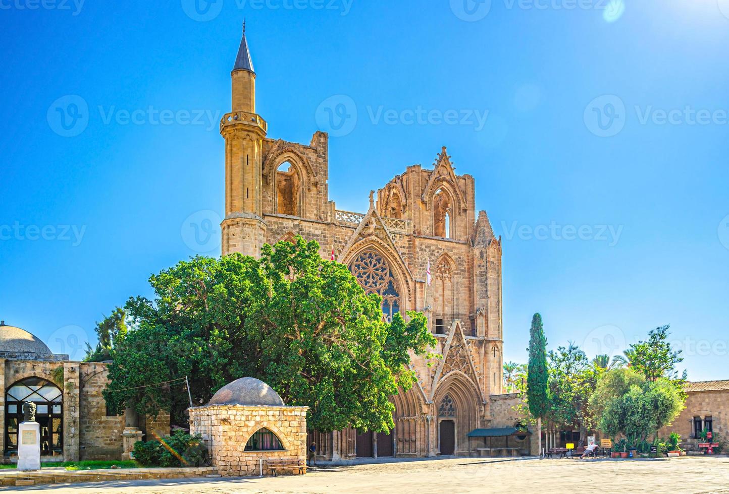 Lala Mustafa Pasha Camii Mosque or Old Cathedral of Saint Nicholas medieval building with minaret in Famagusta photo