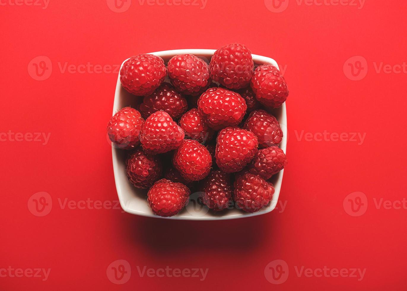 closeup of raspberries in a bowl photo