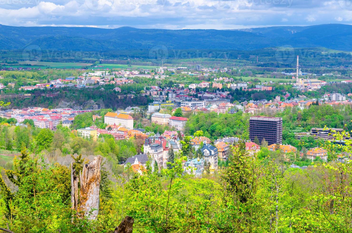 Karlovy Vary Carlsbad historical city centre top aerial view with colorful beautiful buildings photo