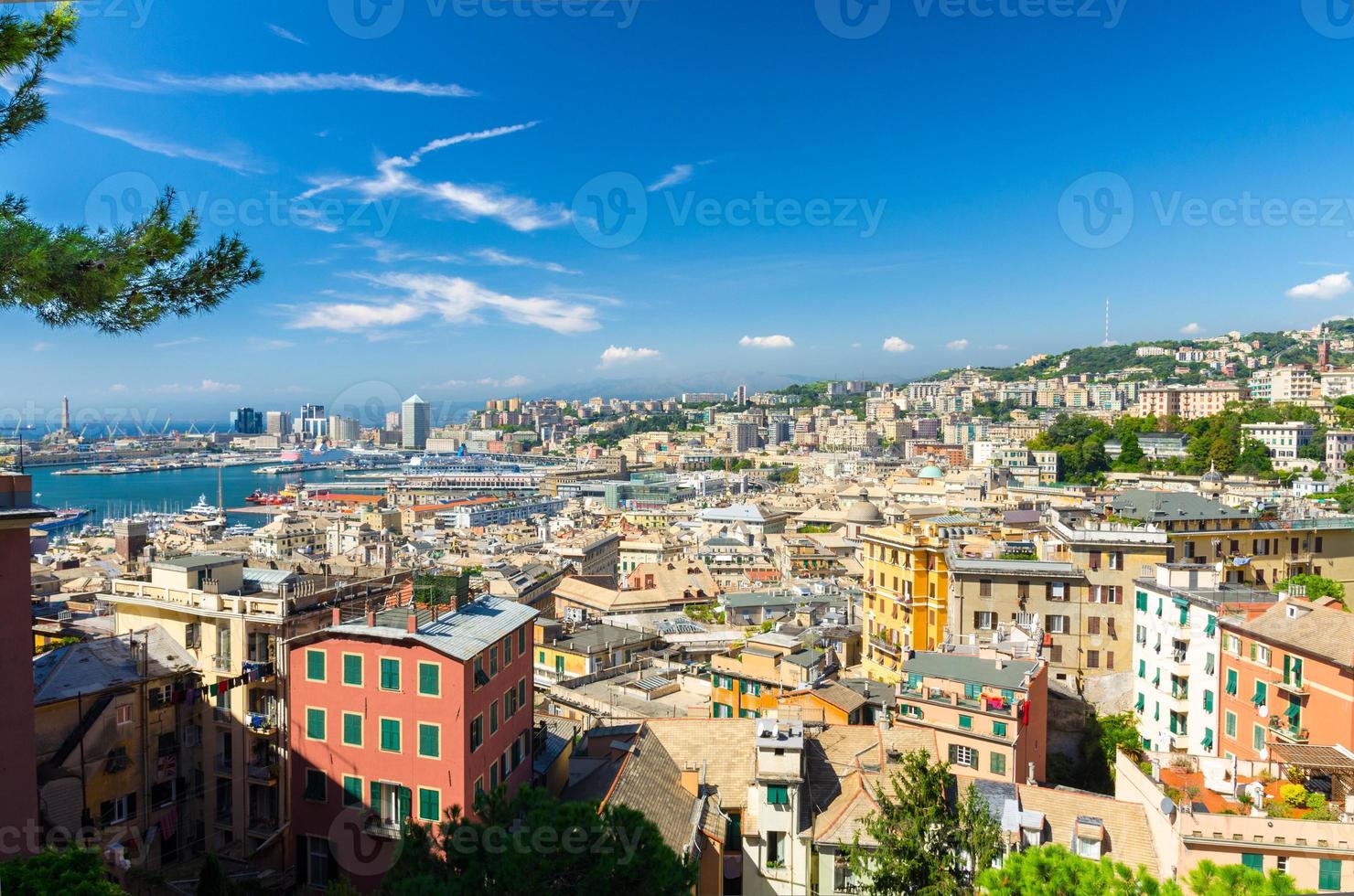 Top aerial scenic panoramic view from above of old historical centre quarter and modern districts of european city Genoa photo