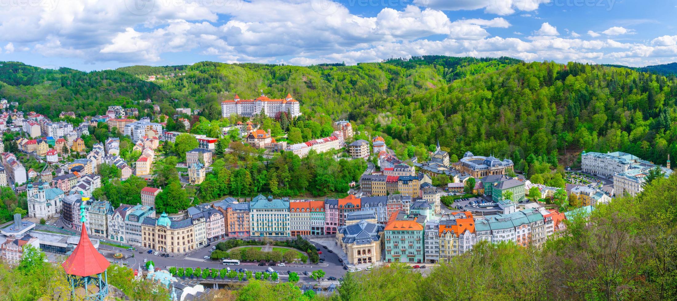 Karlovy Vary city aerial panoramic view with row of colorful multicolored buildings photo