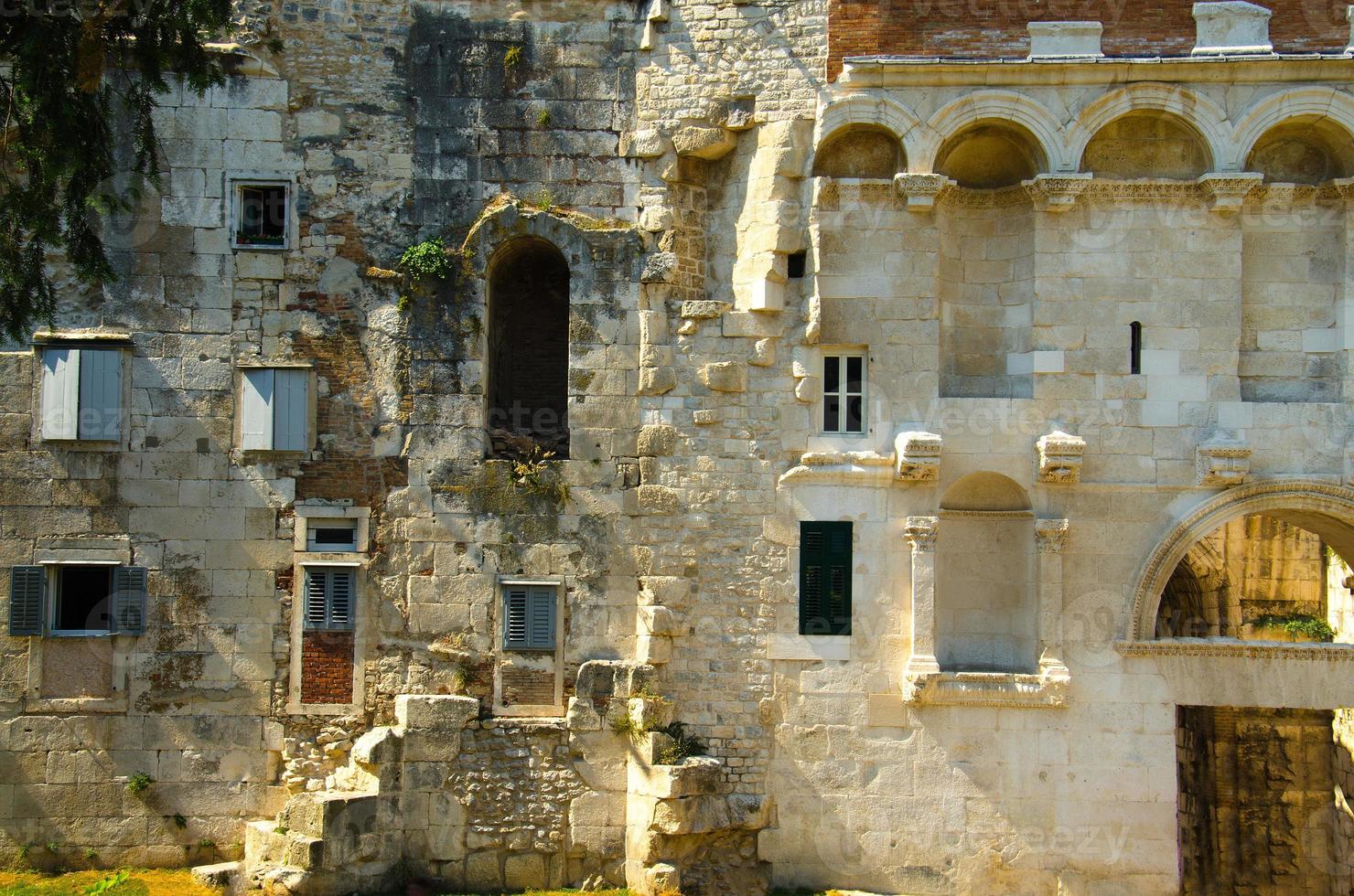 Ancient stone city wall Kinoteka Golden Gate, Split, Dalmatia, Croatia photo