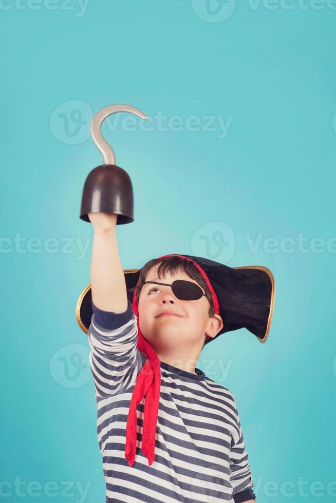 smiling boy dressed as a pirate photo