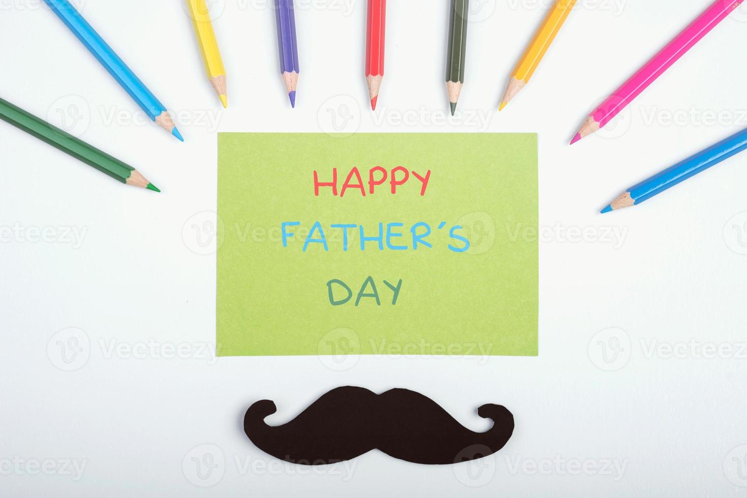 Colored pencils and father's day greetings photo