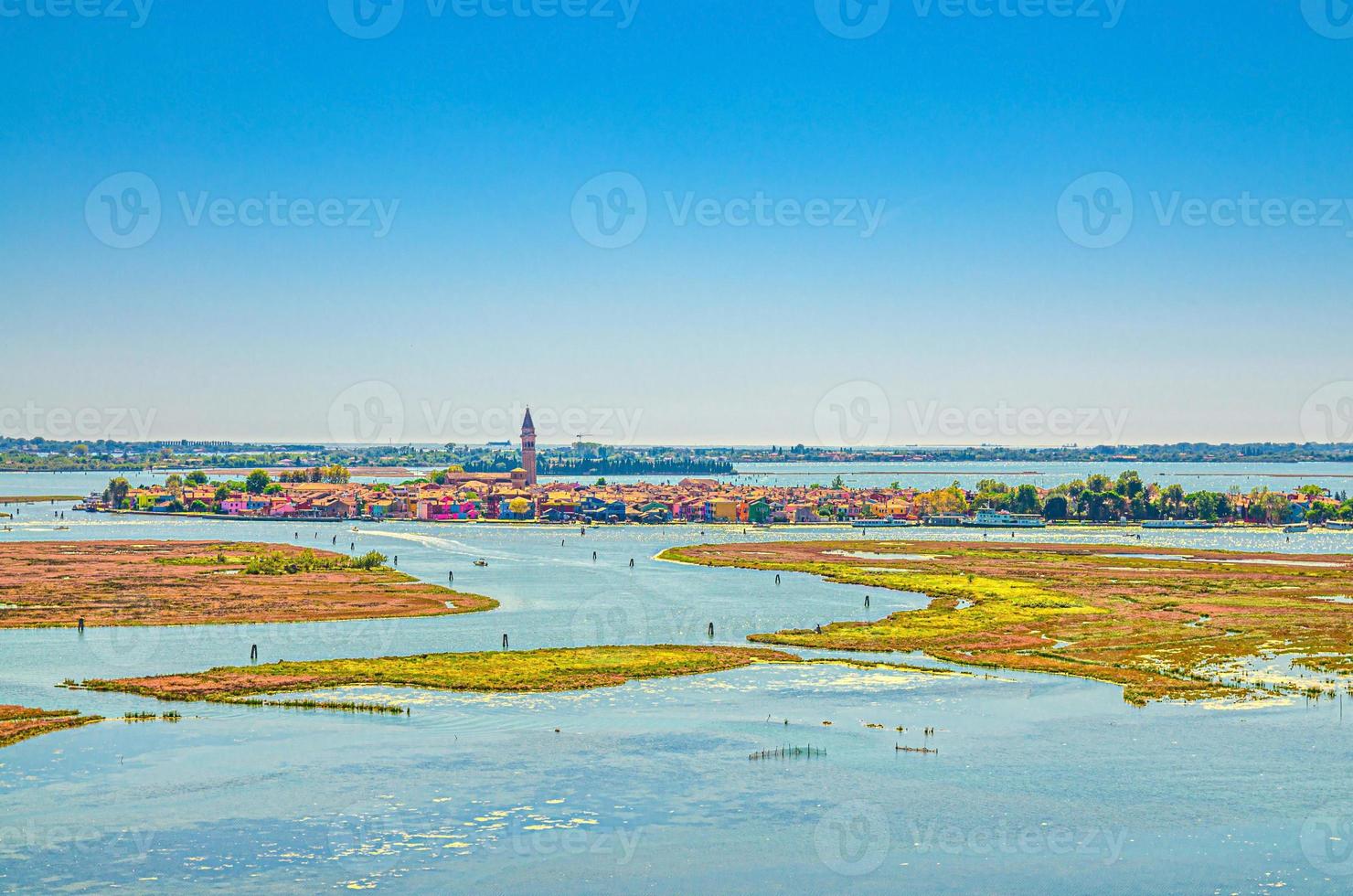 Aerial panoramic view of Venetian Lagoon with Burano island, water canals and swamp photo