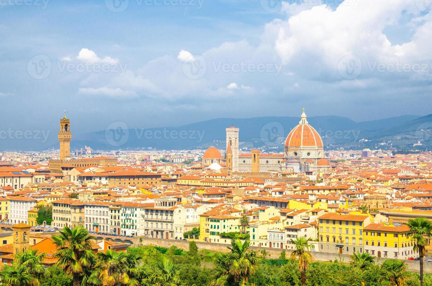 Top aerial panoramic view of Florence city with Duomo Cattedrale di Santa Maria del Fiore cathedral photo