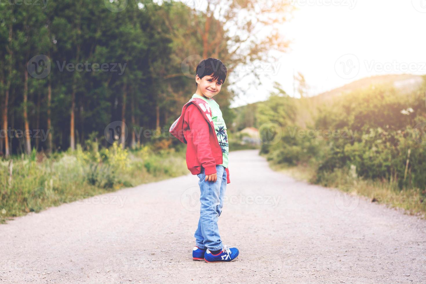 happy child smiling in the field photo