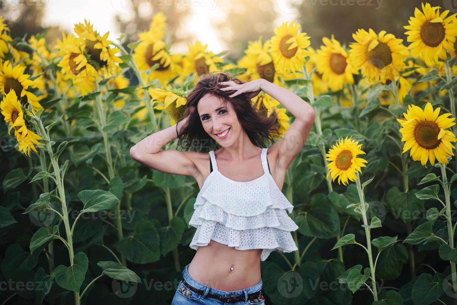 girl in the field of sunflowers outdoor photo