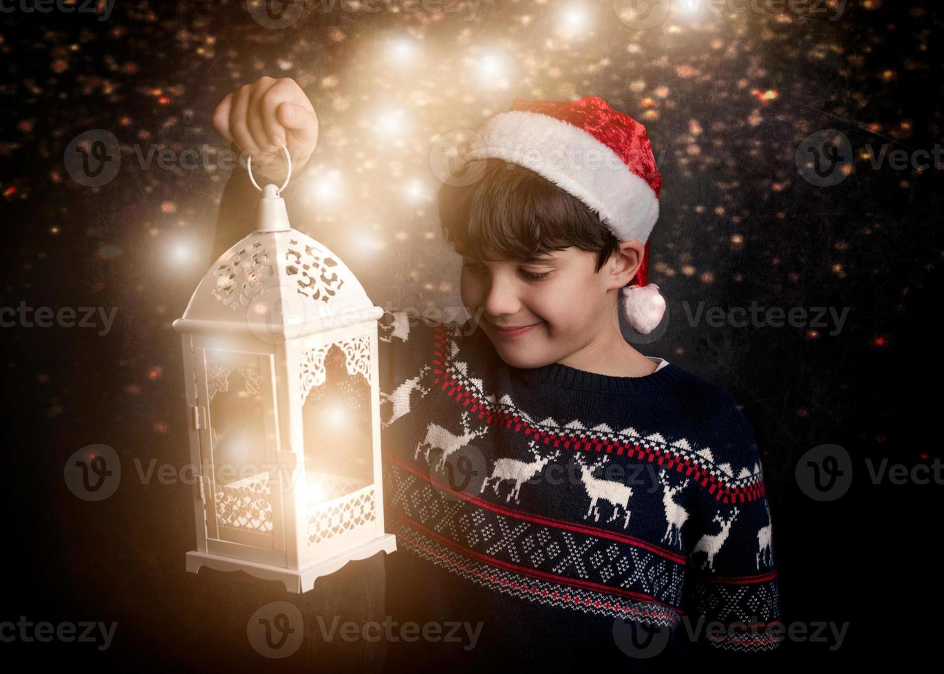 Happy child on Christmas eve photo