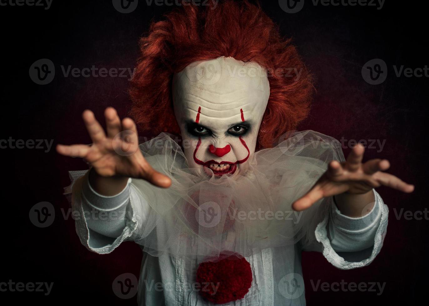 boy dressed as a clown photo
