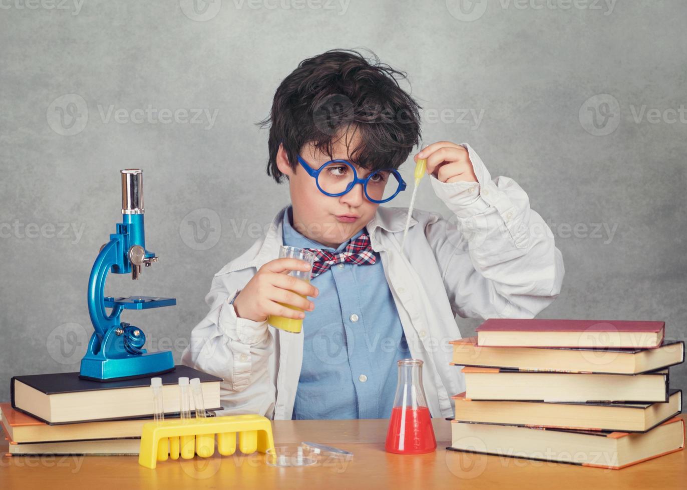 boy is making science experiments photo