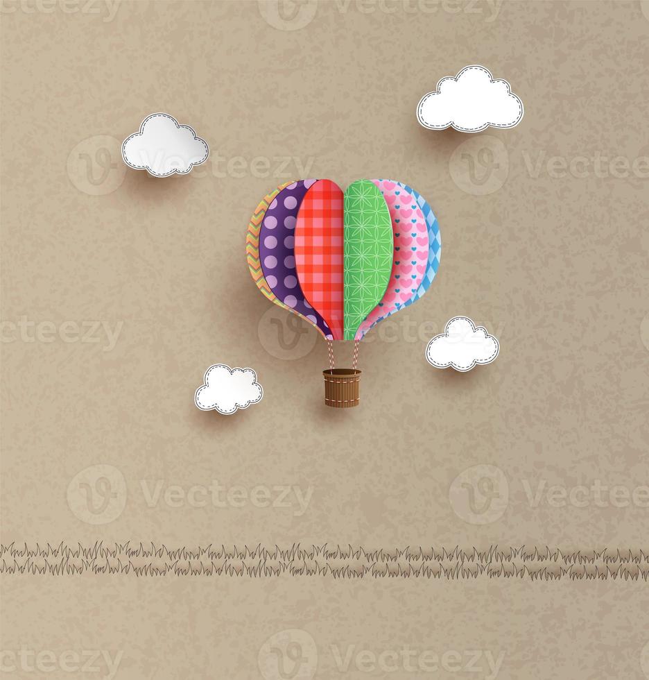 Origami made hot air balloon and cloud photo