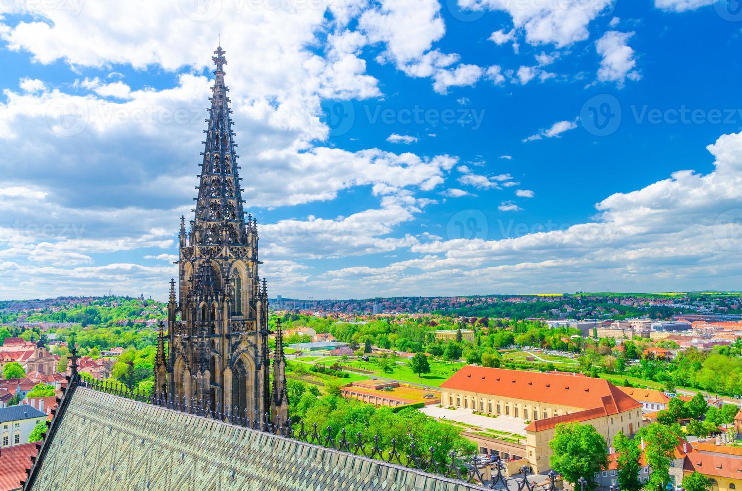 Top aerial view of Prague Royal Garden and roof and spire of St. Vitus cathedral photo