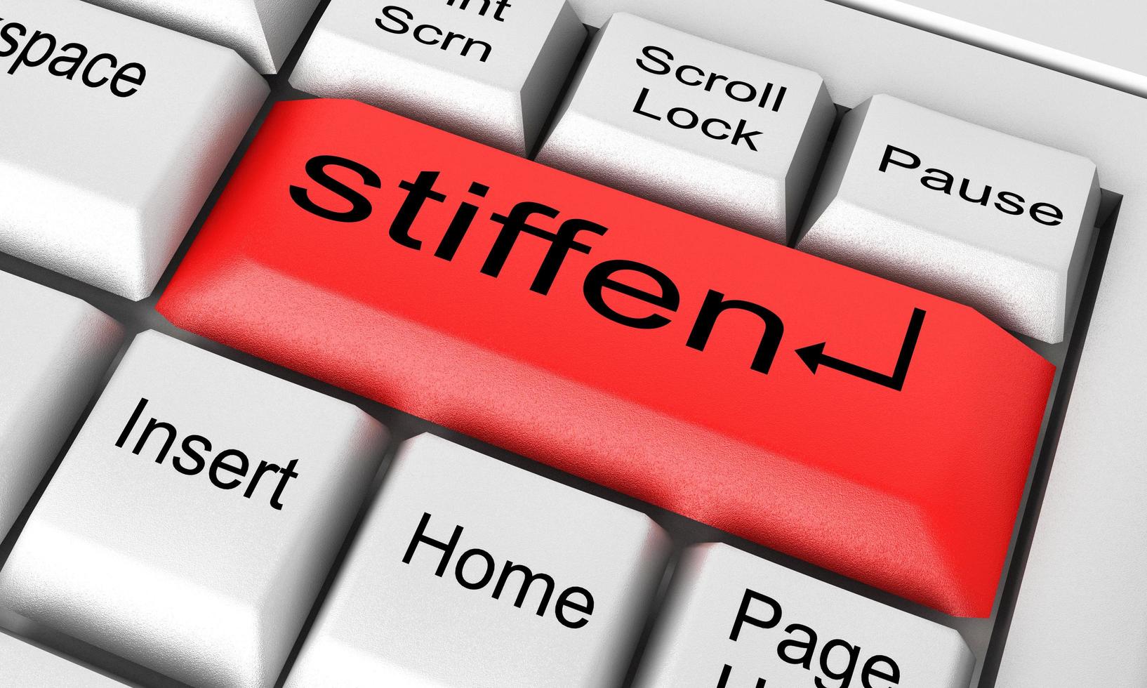 stiffen word on white keyboard photo