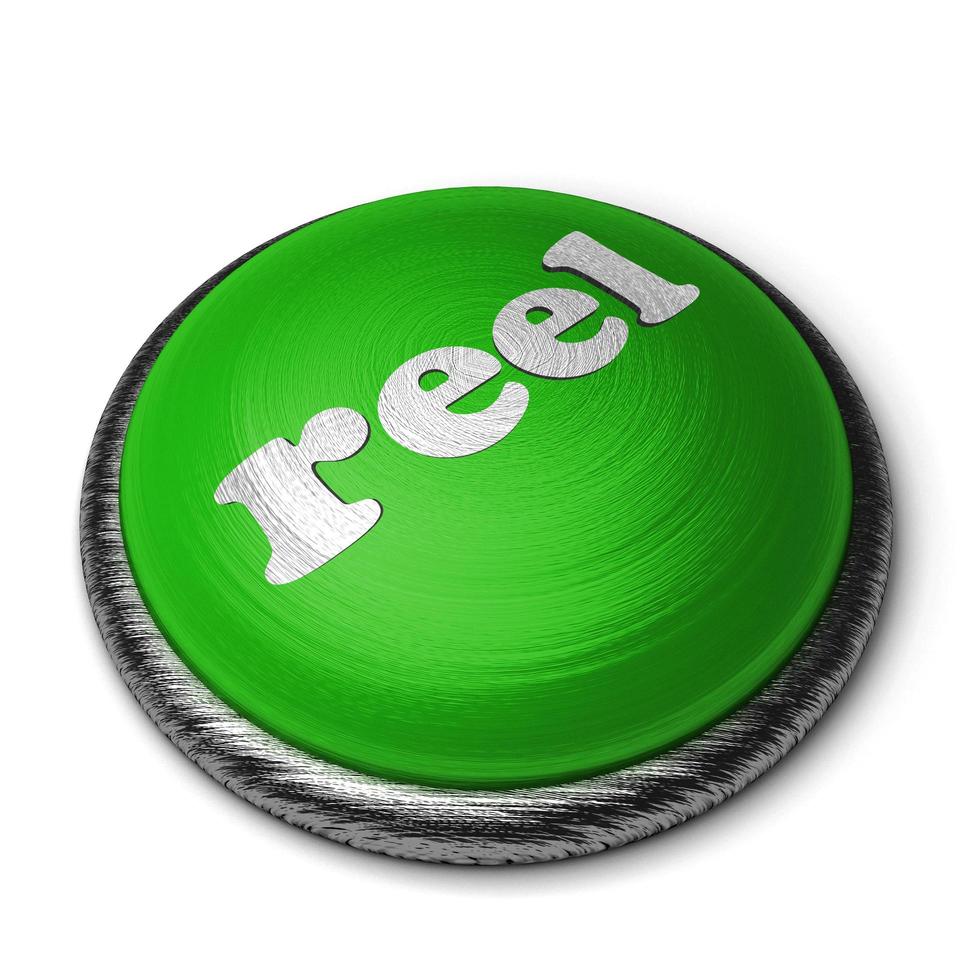 reel word on green button isolated on white photo