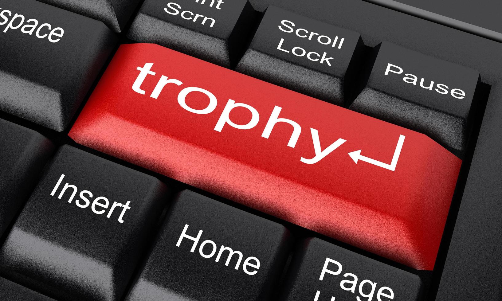 trophy word on red keyboard button photo