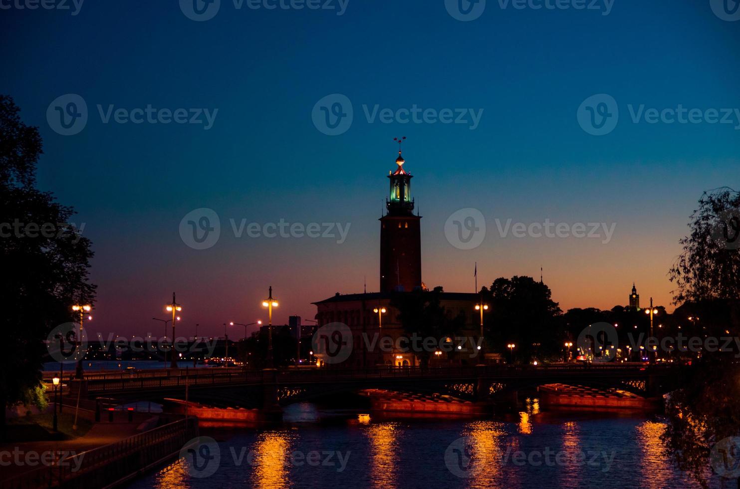 Stockholm City Hall Stadshuset tower at sunset, dusk, Sweden photo