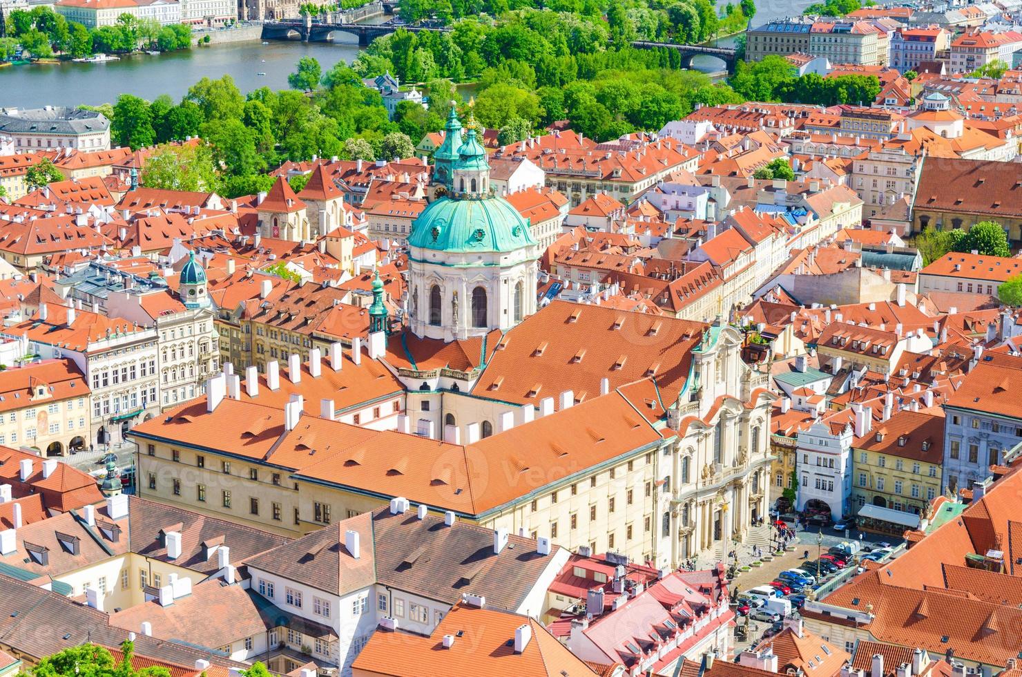 Top aerial view of Prague historical city centre with red tiled roof buildings photo