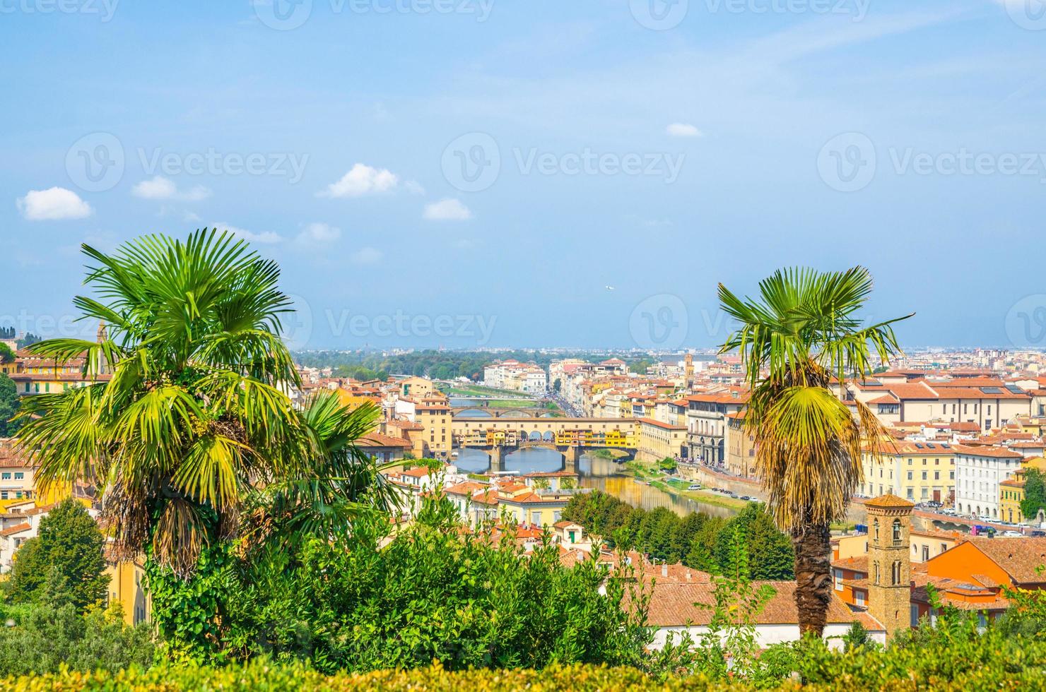 Top aerial panoramic view of Florence city with Ponte Vecchio bridge over Arno river photo