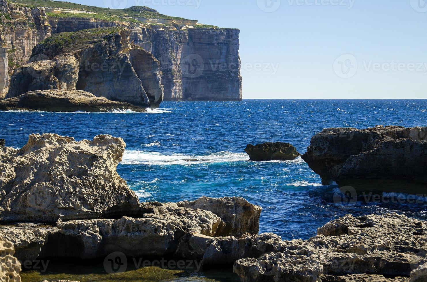 Fungus and Gebla Rock cliffs near Azure window, Gozo island, Malta photo