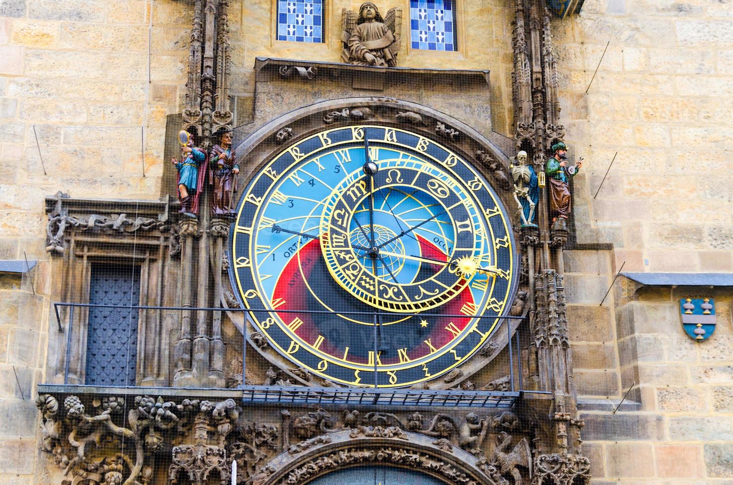 Closeup Prague Astronomical Clock Orloj with small figures located at the medieval Old Town Hall photo
