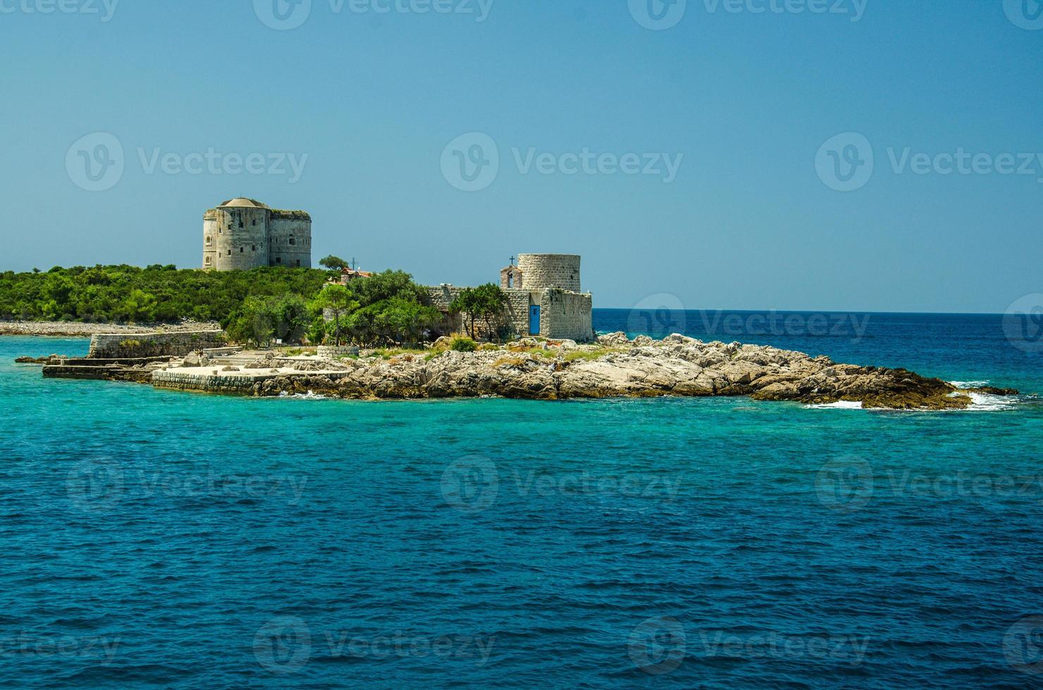 Monastery and church on island in Boka Kotor bay, Montenegro photo