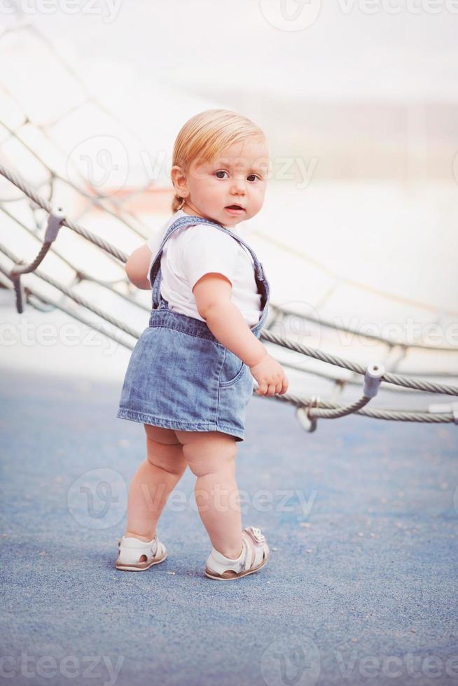 little baby on playground photo
