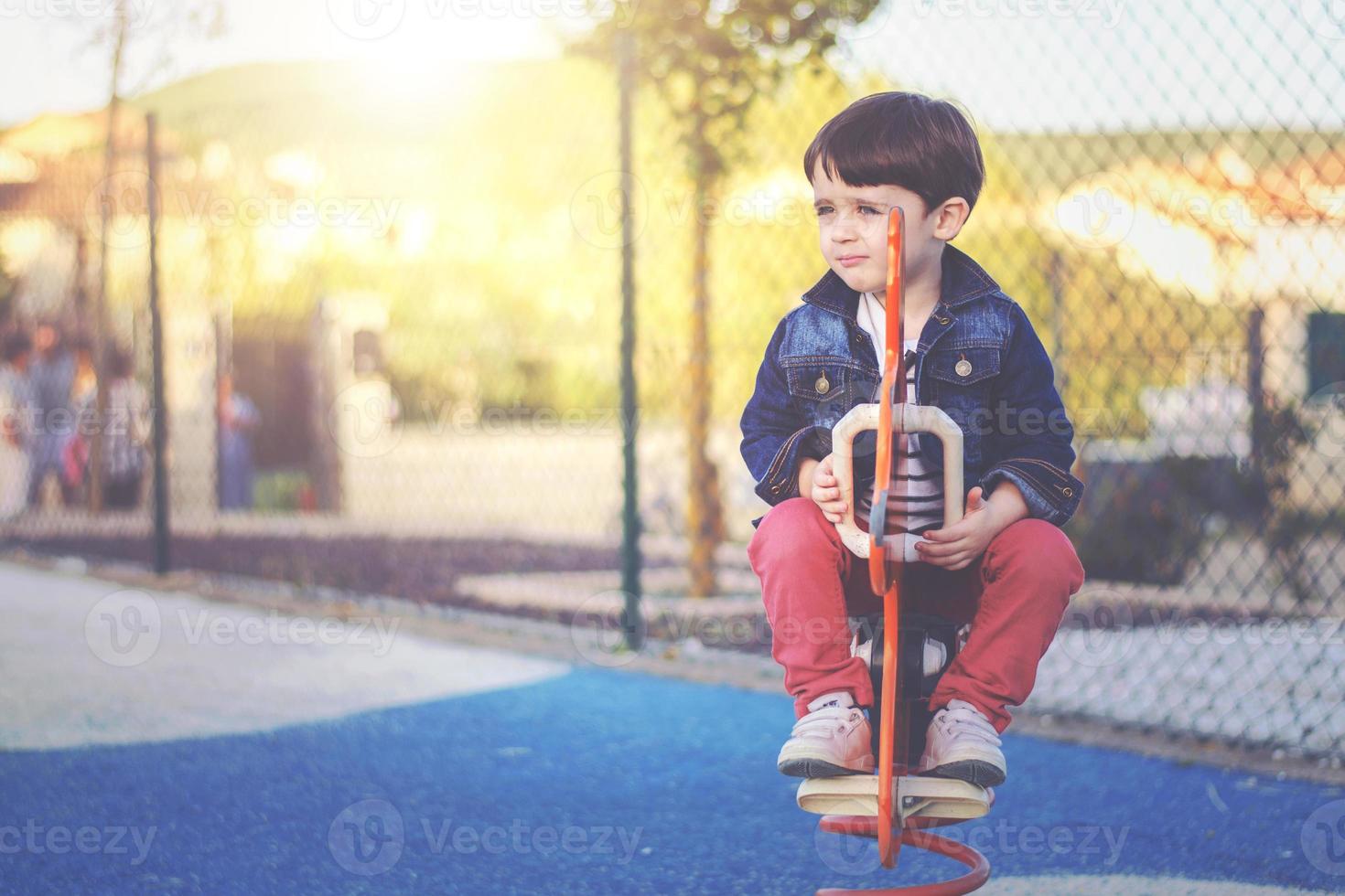 happy child playing in the park photo