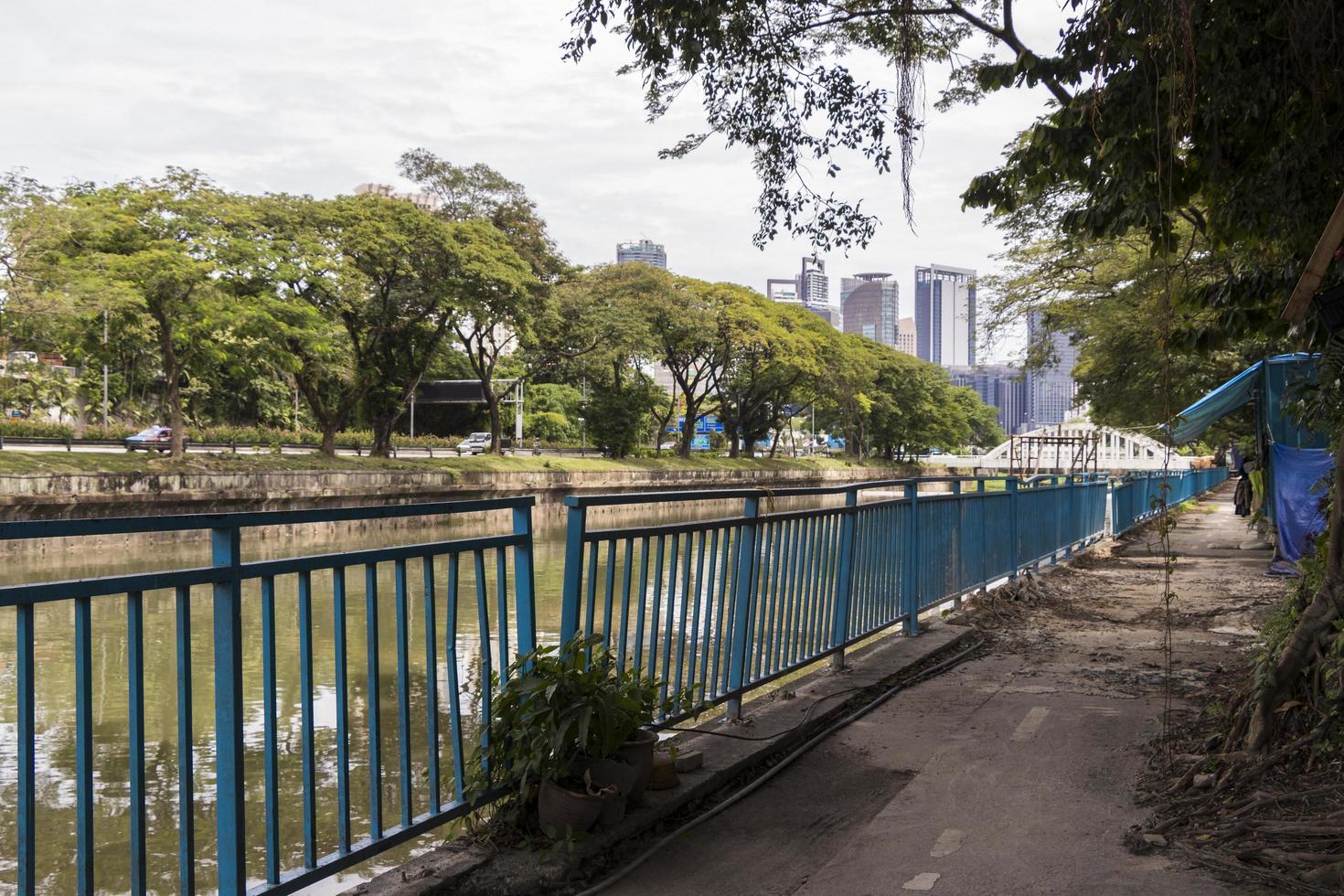 Hiking trail with blue fence on the River of Life. photo