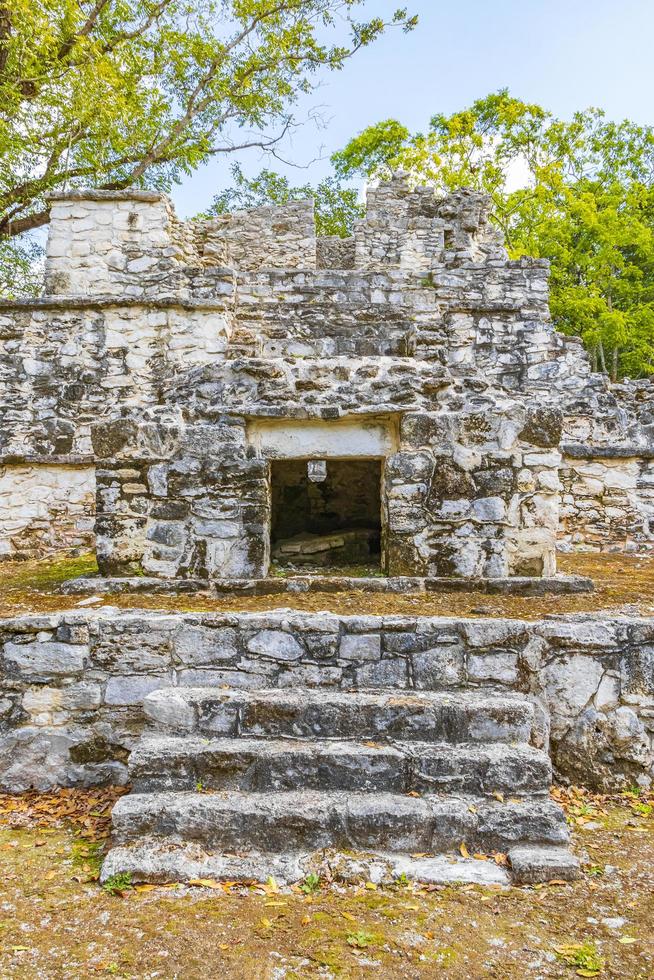 Ancient Mayan site with temple ruins pyramids artifacts Muyil Mexico. photo