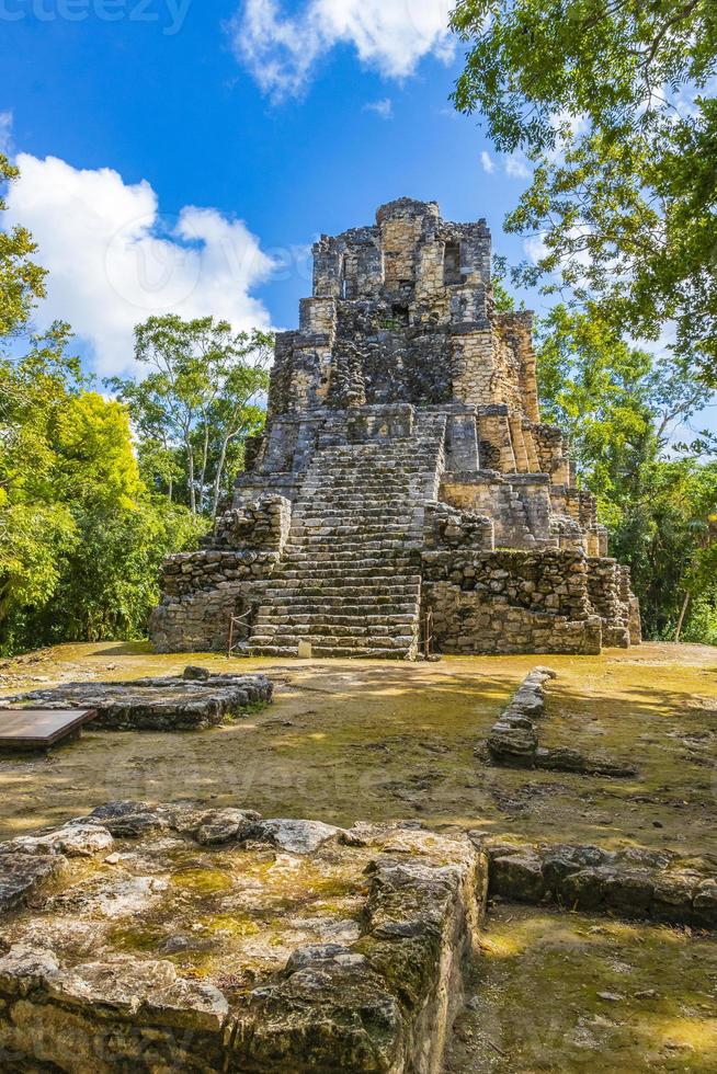 Ancient Mayan site with temple ruins pyramids artifacts Muyil Mexico. photo