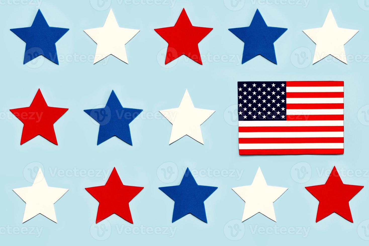 Independence day July 4th. Top view of creative pattern made of stars and american flag photo