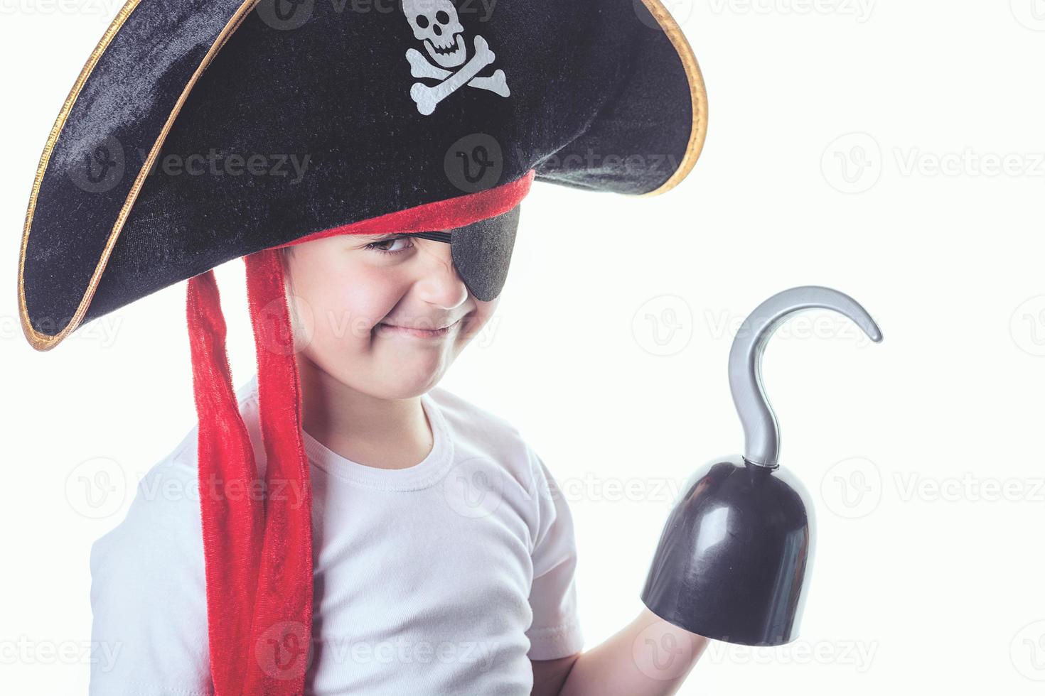 smiling boy dressed as a pirate photo