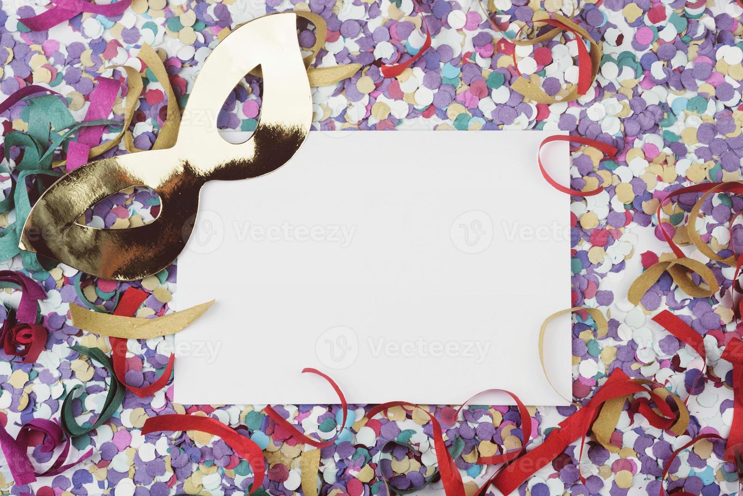 carnival mask with confetti photo