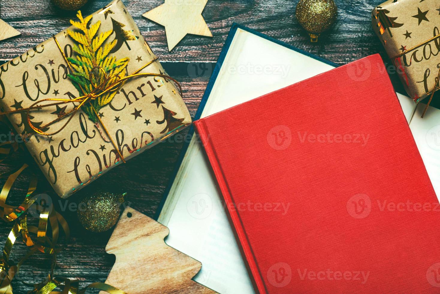 Merry Christmas. Top view of books, Christmas gifts and Christmas decorations. Christmas concept background photo