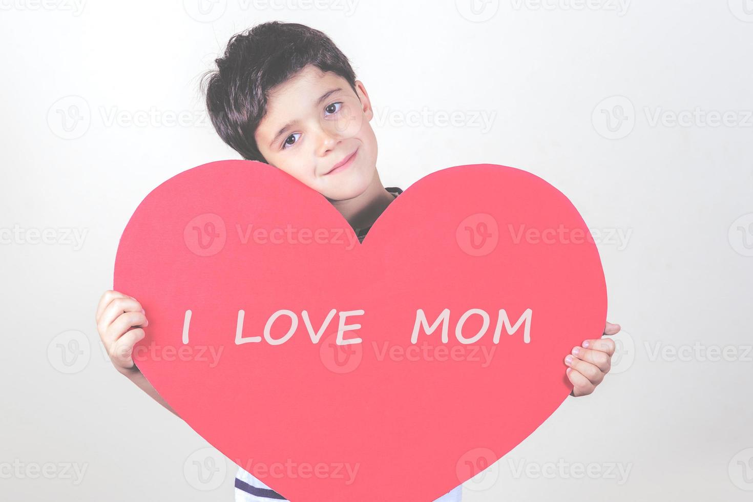 I love mom, happy child with a red heart photo