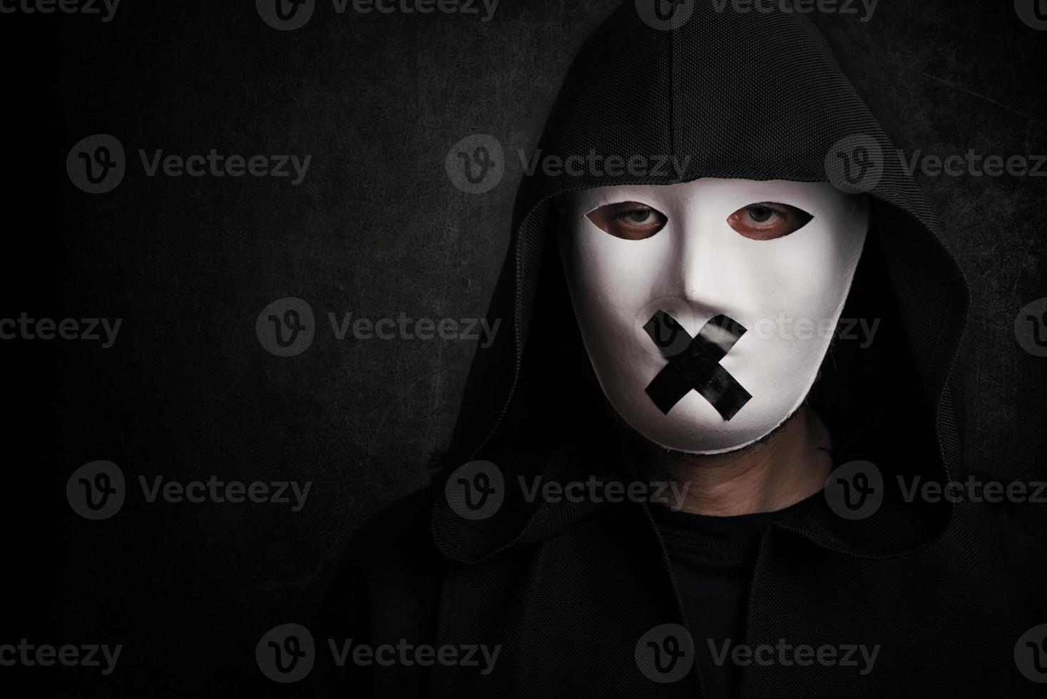 Mysterious man with mask photo
