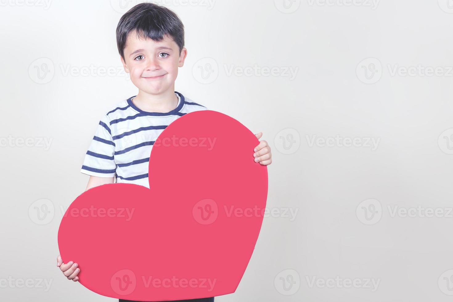 happy child with a red heart photo