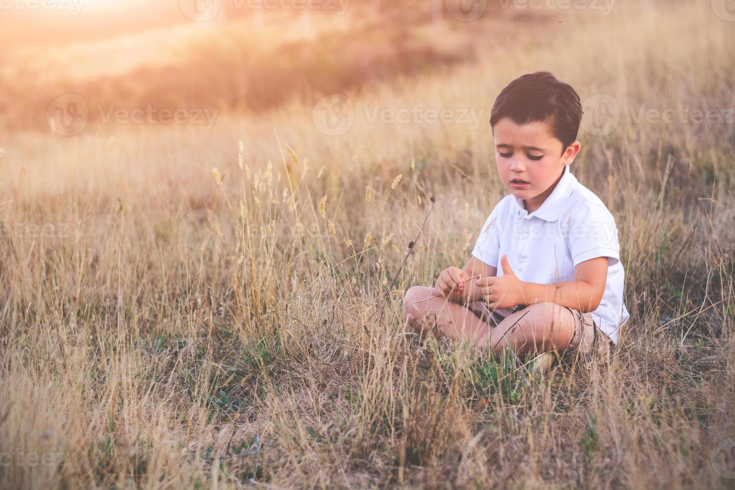 Sad boy outdoor photo