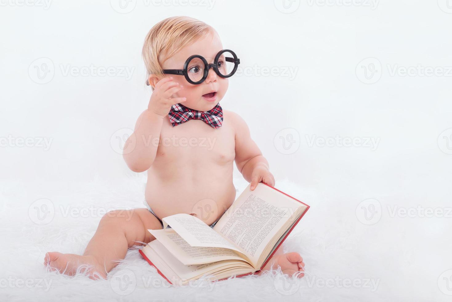 Baby reading a book photo