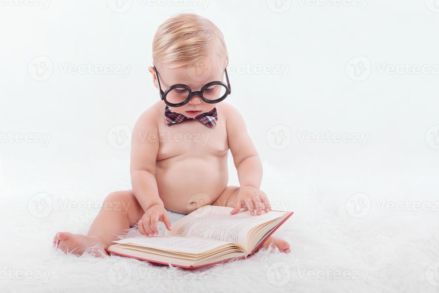 Baby reading a book photo