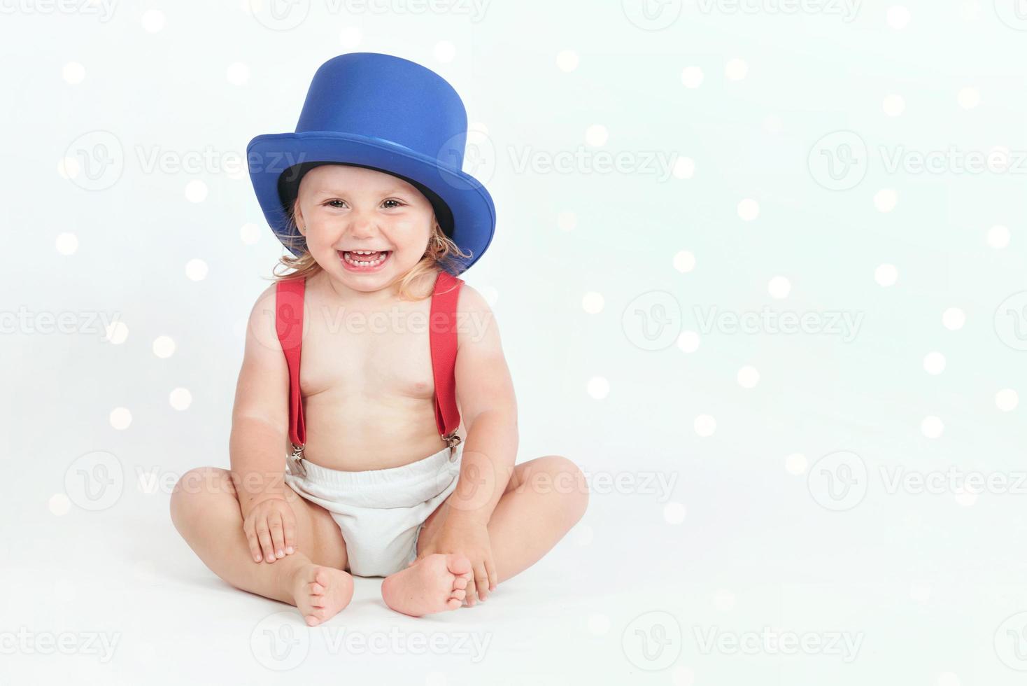 Smiling baby with hat photo