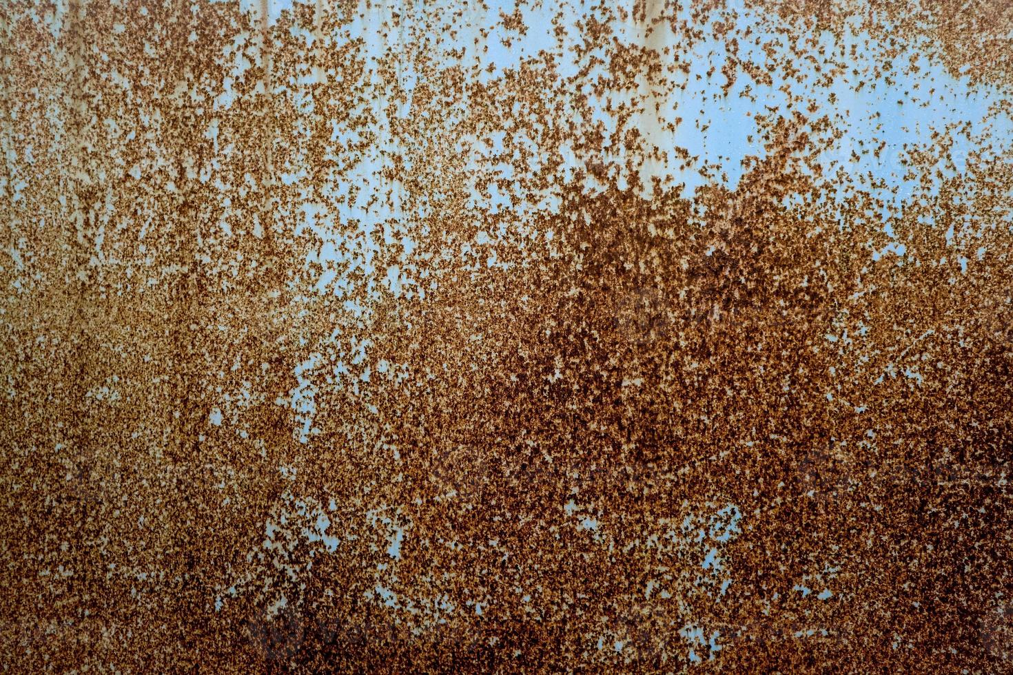 Grunge rusty metal texture. Rusted and oxidized background. photo