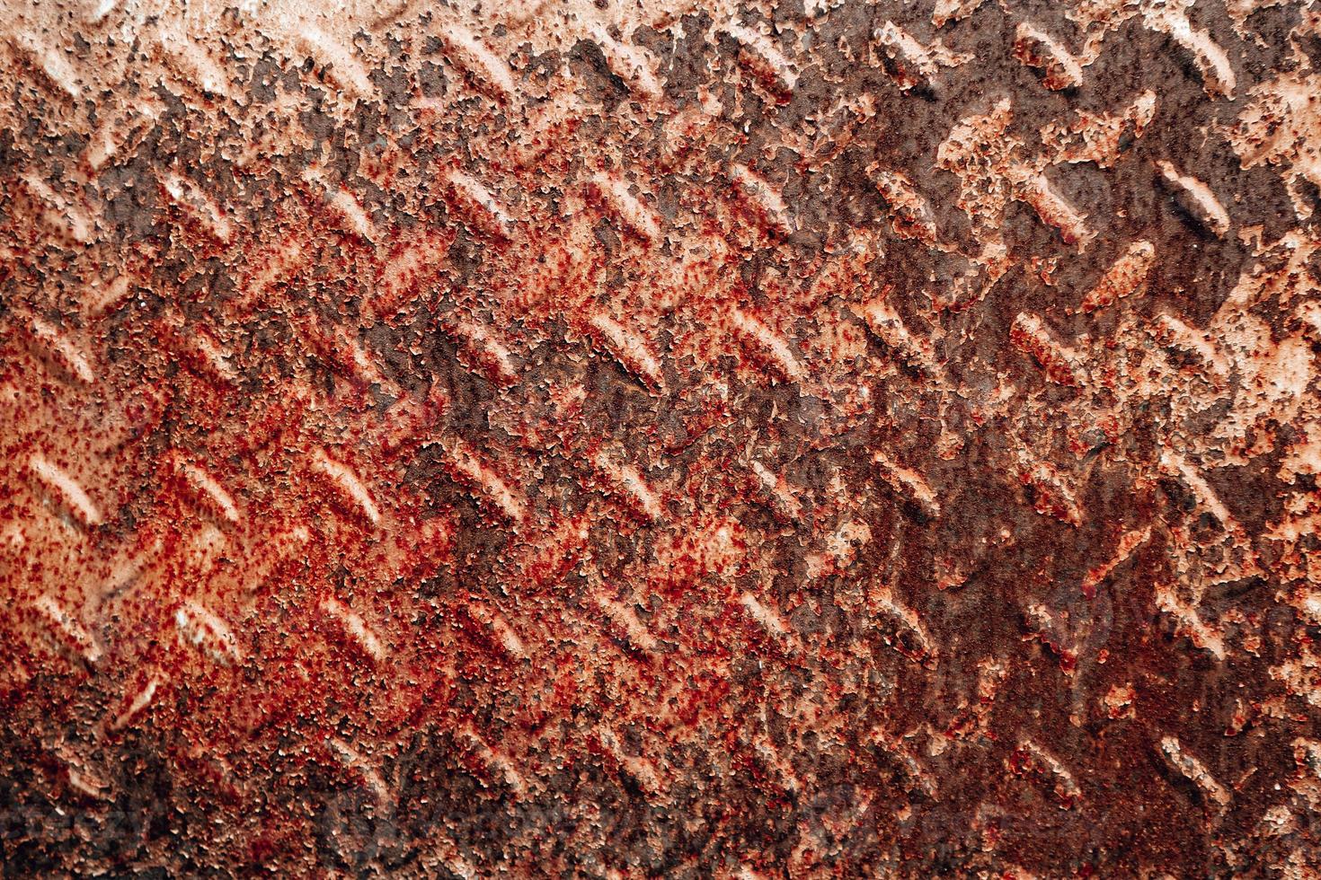 Grunge rusty metal texture. Rusted and oxidized background. photo