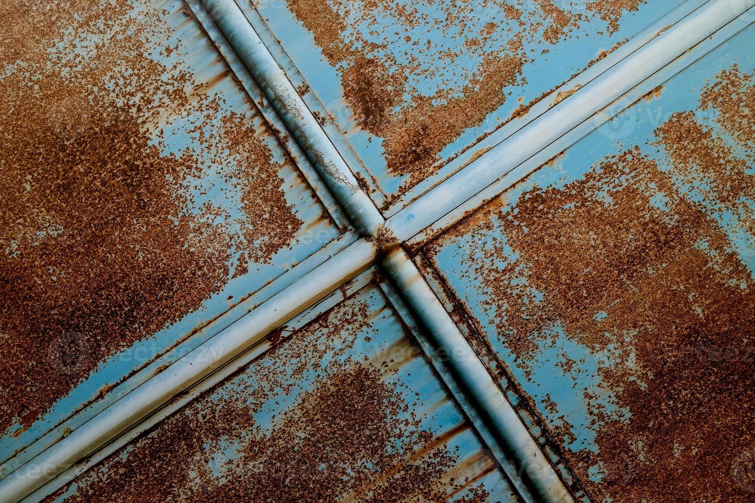 Grunge rusty metal texture. Rusted and oxidized background. photo